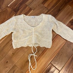 Long sleeve eyelet sweater